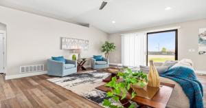 AI-powered video creation turns a modern living room photo with natural lighting and stylish furniture into a dynamic real estate video scene.