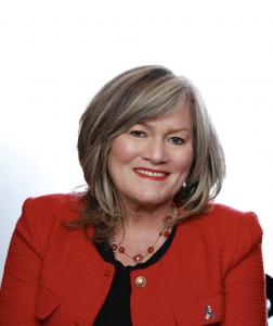 Carolyn Rush, Democratic candidate for the New Jersey General Assembly, smiling in a professional headshot against a light background