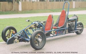 Three wheel motor vehicle. Two wheels in front mounted to a cross beam. A chassis pivot mounted in the middle of the beam. Chassis, driver and engine are connected to this pivot to allow the vehicle to lean into corners.
