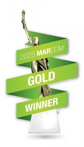 Gold MarCom award with green ribbon wrapping around