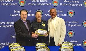 PICUTRED: ROSARIO S. CASSATA OF THE CASSATA FOUNDATION, MARCO ISLAND POLICE CHIEF FRAZZANO, LIFEVAC CEOARTHUR LIH