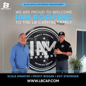 Two men standing by a logo