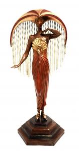 Bronze sculpture “Le Soleil” (1983) by Erté depicting a stylized woman with a radiant sunburst headdress.