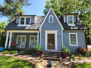 Blue home exterior remodeled by Hatch Homes with James Hardie® fiber cement siding.