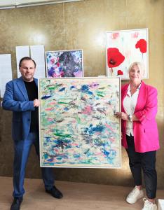 Heinz Playner and Nada Kelemen with the painting "Spring" for Paris art fair