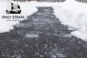an example of safely treated sidewalks during winter storm: winter road salting and reliable snow removal and plowing services provided by only strata snow removal