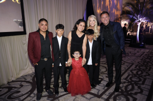 IMAGE 3: Longtime supporters Anthony and Lindsay Geisler pictured with the courageous 2025 Miracles Family, the Benitez Family