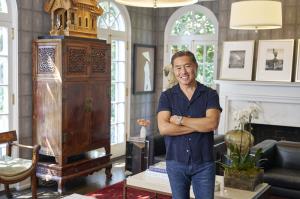 TV star Vern Yip standing inside his home