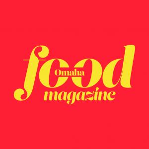 Omaha Food Magazine’s new logo featuring bold yellow typography on a red background, representing the publication’s fresh, modern rebrand and celebration of local food culture.