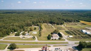 "Hidden Acres Family Campground": 34± acres, office, cabins, bath houses, pool, pond & Rt. 301 frontage in Caroline County, VA . 590'± of frontage on Rt. 301 •	The campground property has a main office building (4,098± sf. vinyl sided) which features 2 bathrooms,