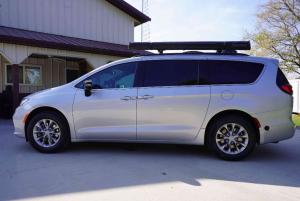 Side view of the 2026 AWD Pacifica Mini-T Campervan by DLM-Distribution, showcasing its compact design and new model availability for 2026