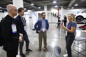 An exhibitor demonstration inside "Joe's Garage" at AAPEX 2024