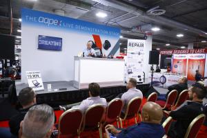 An exhibitor provides a demonstration at AAPEX 2024