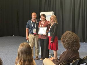 Kelly Schaeffer Receiving Award