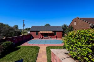The 7 BR/4.5 BA home is located on a .27± acre lot and is complemented by a detached 1 BR/1 BA guest cottage/office, detached pool house with garage/carriage house on ground level and location at the Center Square of Abbottstown