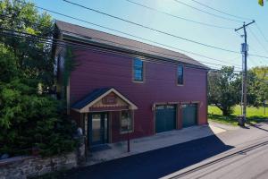 The 7 BR/4.5 BA home is located on a .27± acre lot and is complemented by a detached 1 BR/1 BA guest cottage/office, detached pool house with garage/carriage house on ground level and location at the Center Square of Abbottstown