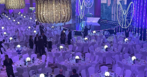 The 2025 Pride of Britain Awards venue during setup, with chandelier lighting and stage design in view.