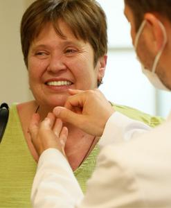Dr. Antipov with patient after surgery