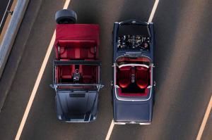 Overhead view of a restored W460 Mercedes G-Wagon and W113 Pagoda parked side by side on an open road, showing symmetrical red interiors and top craftsmanship.