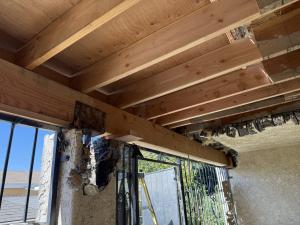 Image of repaid rotting deck in condominium