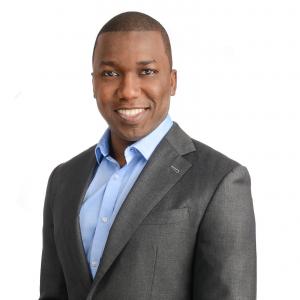 Professional headshot of Mohamed Konate, mortgage broker in Whitby, Ontario, with Mortgage Alliance.