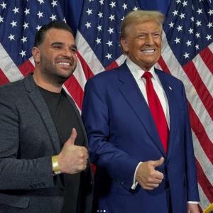 Mark Savaya (left) with U.S. President Donald Trump. 
