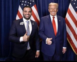 Mark Savaya (left) with U.S. President Donald Trump.