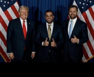 Mark Savaya (center) alongside U.S. President Donald Trump (left) and U.S. Vice President JD Vance (right).