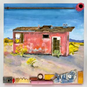 Abandoned shack among yellow flowers