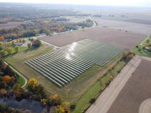 This is a color photograph of a birds-eye-view of a solar PV project in Illinois.