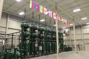 PSA gas separation section with absorbent material used to separate the CO2/N2/O2 from the product gas.