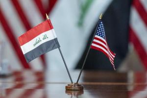 The Iraqi and American flags stand side by side, representing ongoing diplomatic cooperation and partnership