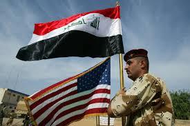 The dual flags of America and Iraq symbolize the strengthened diplomatic and military relationship between the two countries.