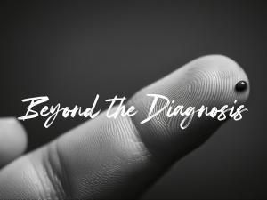 A close-up of a person’s hand performing a blood sugar test, showing a drop of blood on their finger, with the words “Beyond the Diagnosis” overlaid on the image.