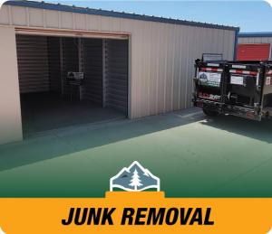 Valley Haul-Off team doing a removal service and loading into their company truck in Tulare County, California.