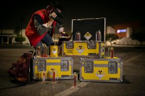 3 yellow Anvil "1.21 Gigawatts" Plutonium Cases and Marty McFly at Twin Pines Mall