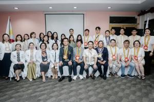 Rotary Club of New Manila East President Karlo Benjamin Nisce and Rotary Club of Daejeon Jungdo President Lee Geon Myoung join QMMC Department of Dermatology Chair Dr. Hildegarde Cabrera and District Governor Milo Lucenario at ceremonial turnover of $72,0