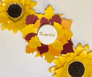 Beautiful handmade Autumn Leaf Thanksgiving centerpiece made with colorful cardstock, showcasing warm fall tones and creative paper crafting ideas.