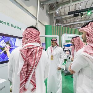 KFSHRC exhibitors engage visitors at the hospital’s pavilion, showcasing advanced medical innovations and training solutions during the Global Health Exhibition 2025 in Riyadh.
