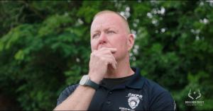 Donnie Penix pauses for a moment of reflection, the weight of years of service visible in his expression. Like many first responders, he carries the unseen burdens that come with a life spent protecting others.