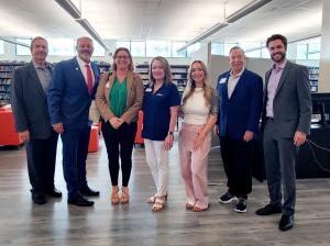 The Transworld Business Advisors team with Junior Achievement 3DE students at McArthur High School during the 2025 Senior Consultancy kickoff event