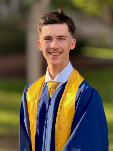 Phoenix Juneau Austin, 16, earning his Bachelor of Science in Business Management.
