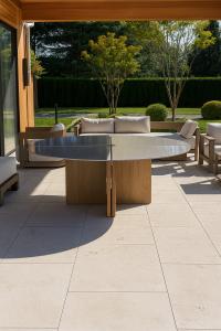 Custom white oak table with brushed metal top by Formhaus in Westhampton, NY