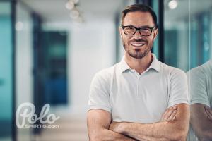 Men standing in an office, wearing a custom branded polo shirt