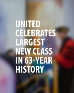 Graphic features a blurred photo of a person in academic robe and cap speaking. Over the image is white text, “United | Celebrates | Largest | New Class | In 63-Year |  History”