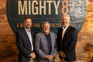 Mighty 8th leaders Jonathan Holmes, retiring Managing Partner, with Bradley Sherwood, Managing Partner, and Jeff Timler, incoming Co-Managing Partner, at the agency’s Buford, Georgia headquarters.