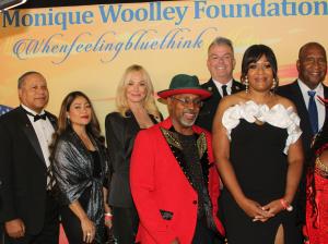 Brigadier General Larry K. Adams and his wife Glenna, Taylor Armstrong, Fire Chief Matthew Hallock, Mayor of Inglewood James Butts, Darrell Dupre VP, Captain (CA) La Stacia Neat