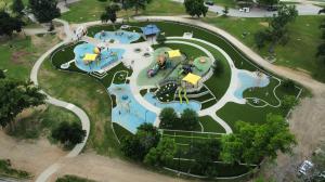 image of an interactive recreational park with synthetic turf