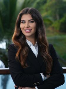 Caroline Farah Lembck CEO of LemVega Capital leadership photo Puerto Rico finance event.