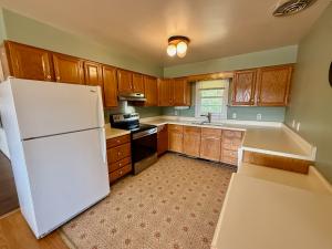 4 BR/2 BA brick ranch/rambler style home with unfinished walk-out basement on 1.49 +/- acres, individual entrances, handicap ramp